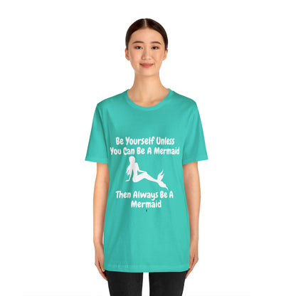 Be a Mermaid T-Shirt - Unisex jersey tee with an enchanting design, soft cotton fabric, and ribbed knit collars, perfect for mermaid enthusiasts and lovers of mermaid-inspired clothing.